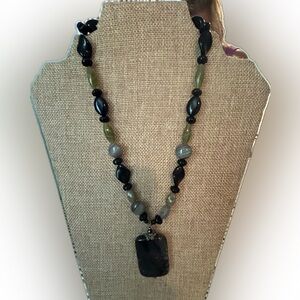 Green and black necklace. Length